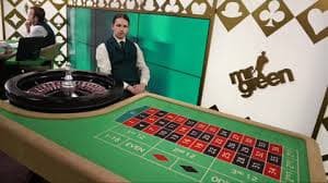 Red Tiger table selection screen showing blackjack, roulette, and baccarat options